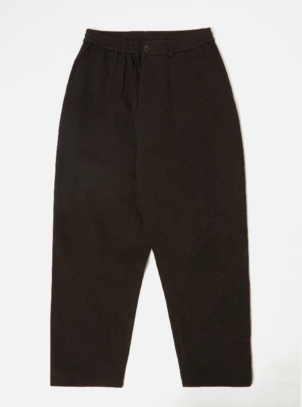 Men's Suits for Cold WeatherUniversal Works Pleated Track Pant in Black Winter Twill