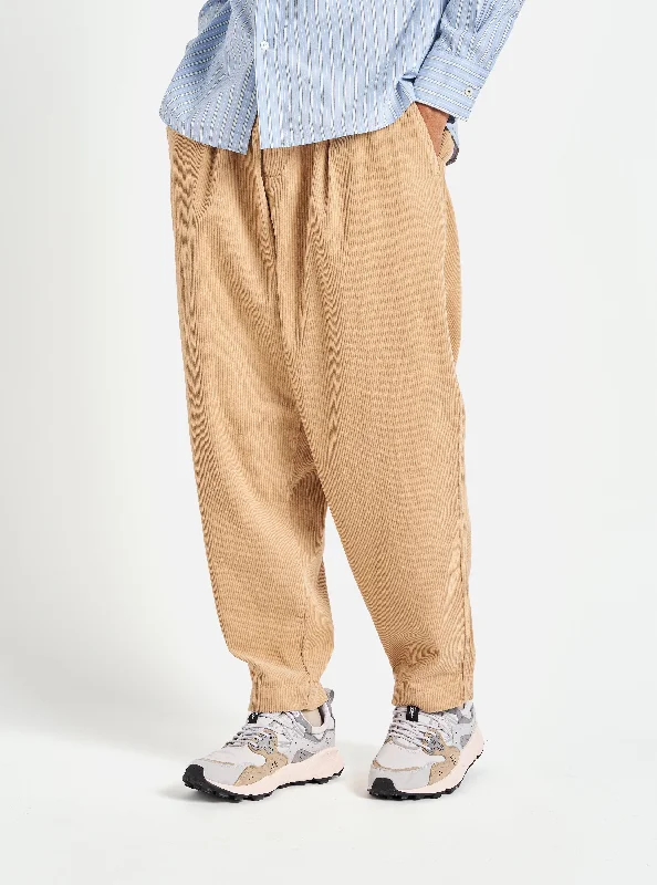 Trendy Men's Patterned SuitsUniversal Works Pleated Track Pant in Fawn Cord